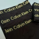 نمای جلو شورت نیم پا مردانه پک ۳ عددی Calvin Klein کش کمر طلایی