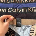 شورت نیم پا مردانه پک سه تایی Calvin Klein با پارچه 95 درصد نخ